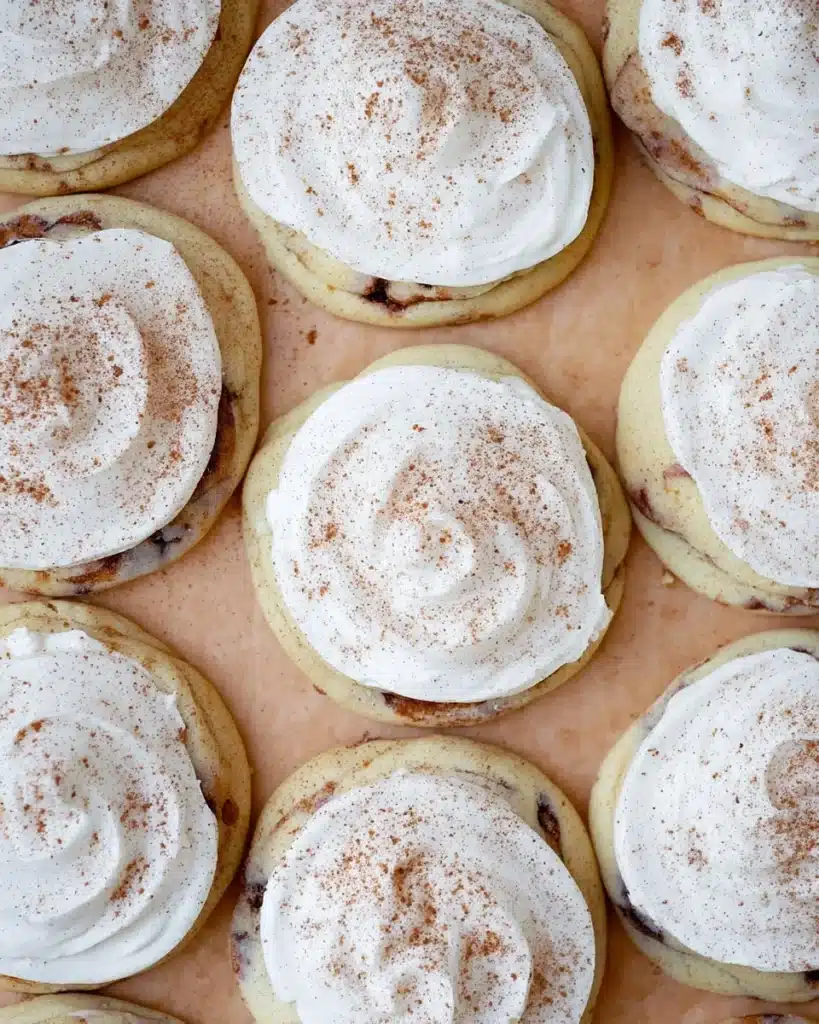 Cinnamon roll cookies with cream cheese frosting and cinnamon sprinkle