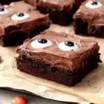 Spooky fudge brownies with candy eyeball decorations for Halloween