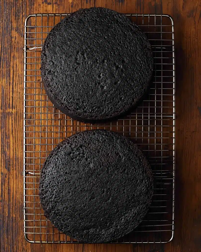 Black Velvet Halloween Cake layers cooling on wire rack