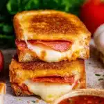 Pizza grilled cheese with melted mozzarella, pepperoni, and golden toasted bread