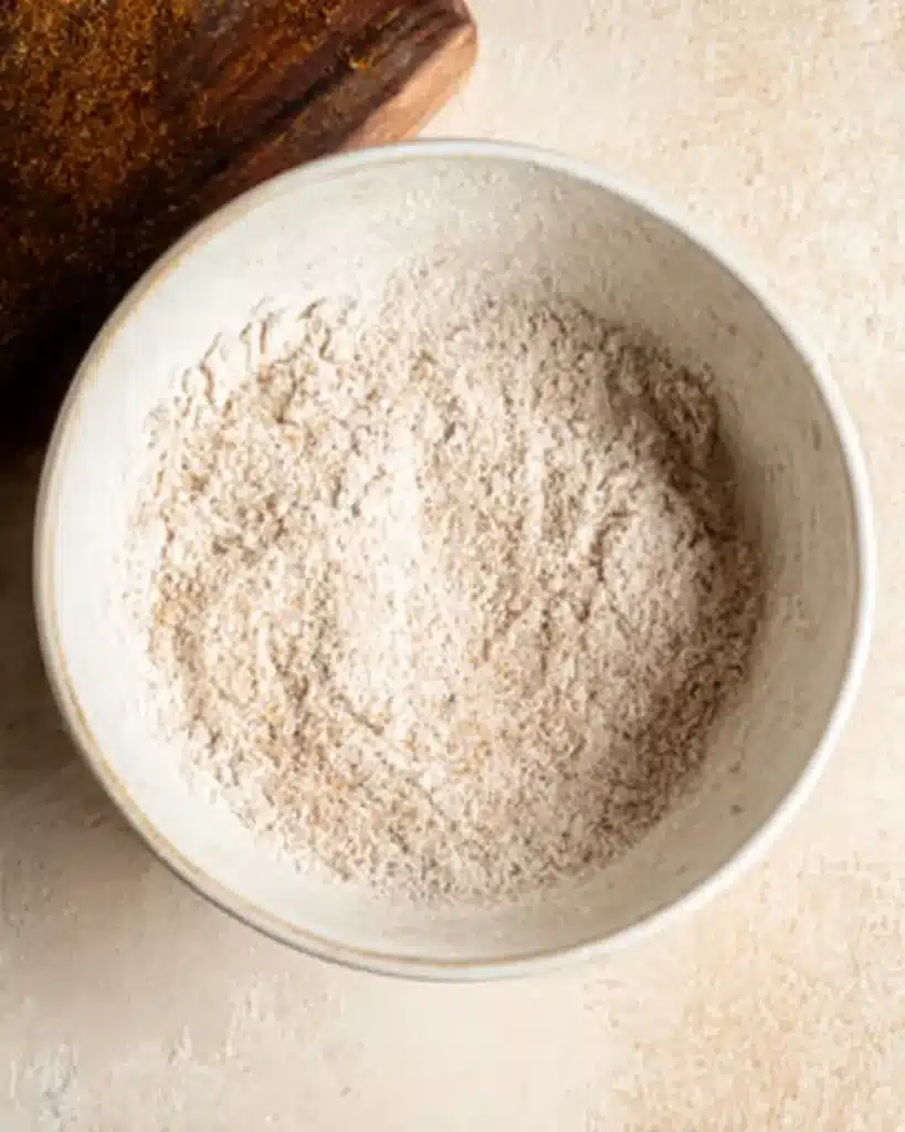 Dry ingredients for The Best Pumpkin Cupcakes in a mixing bowl