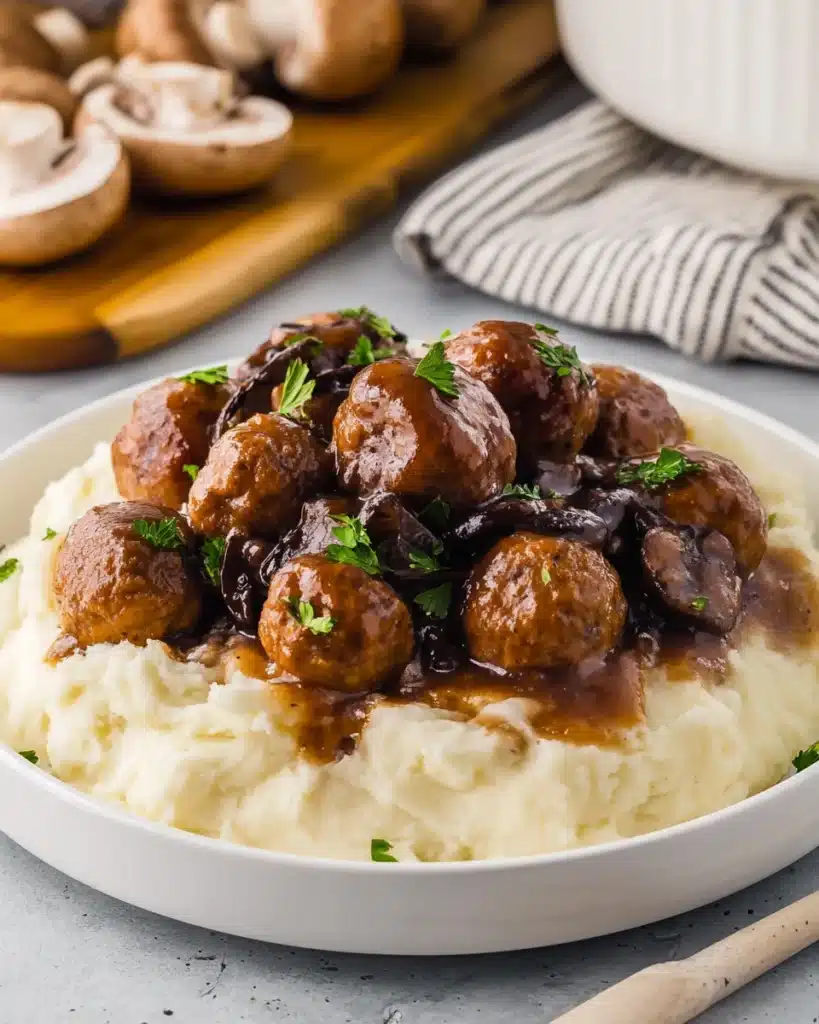Salisbury steak meatballs with mushroom gravy over mashed potatoes