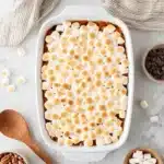 Baked sweet potato casserole with toasted marshmallow topping