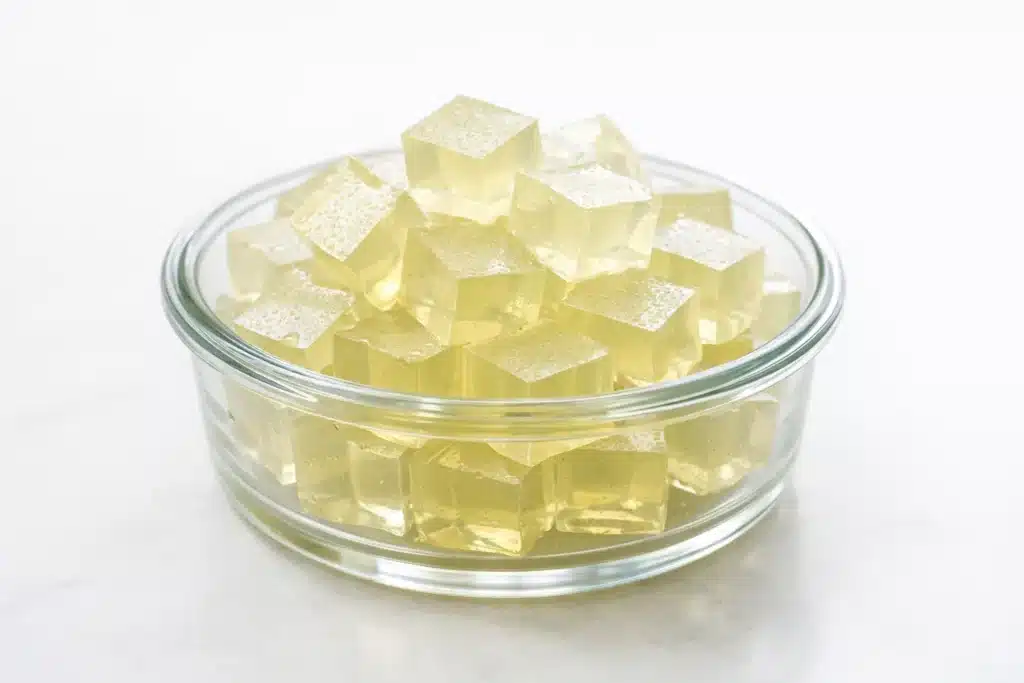 Gelatin cubes for the gelatin trick for weight loss in a glass container