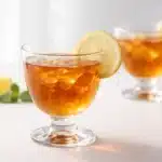 Dr Jennifer Ashton gelatin trick recipe tea drink in a glass cup with lemon