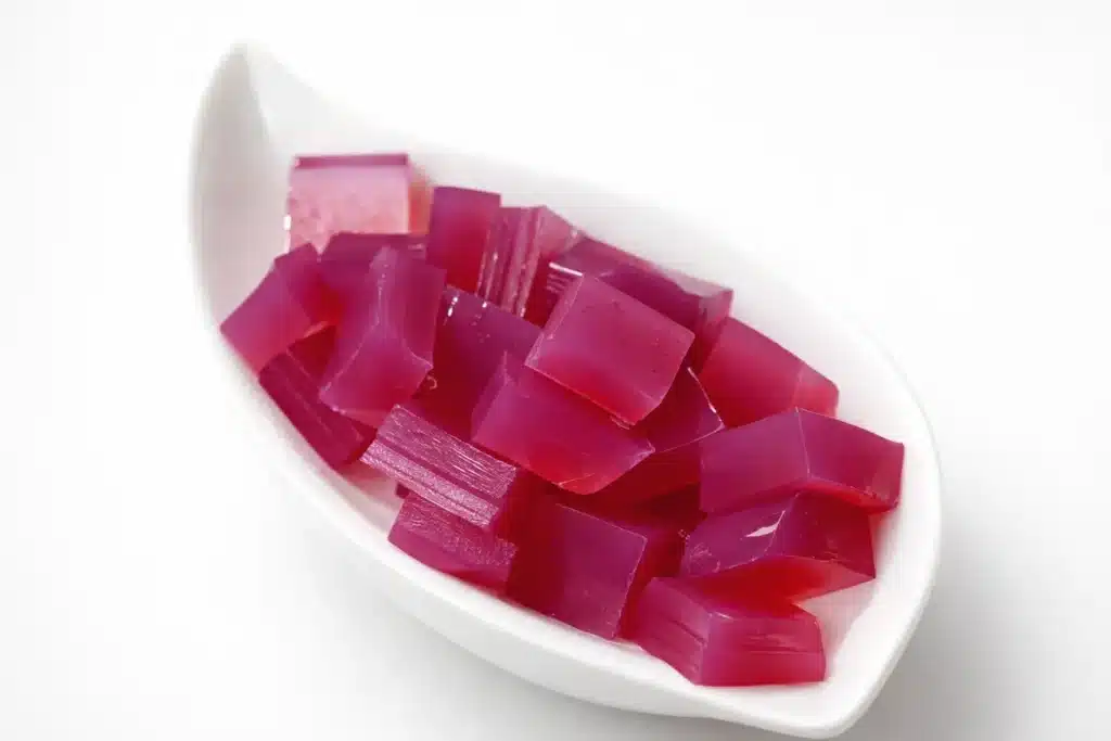 Dr Oz pink gelatin recipe cubes in a white dish